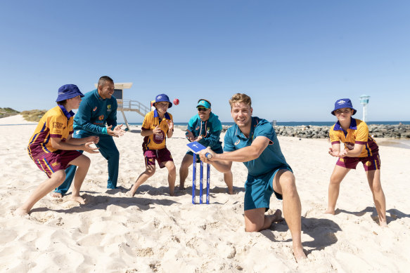 Cameron Green launching the West Indies Test series at City Beach, Perth, with Usman Khawaja, David Warner and juniors from Green’s local club Subiaco-Floreat.