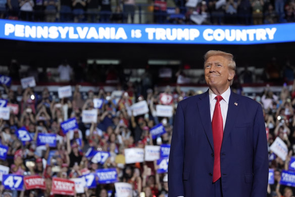 Donald Trump arrives to speak at a campaign rally at the Mohegan Sun Arena at Casey Plaza, 