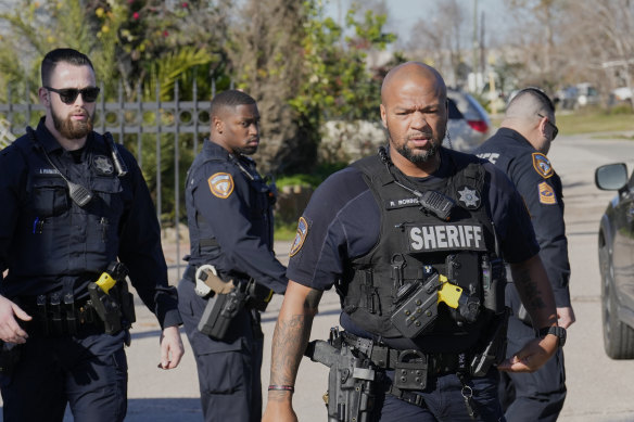 Police in Texas clear media from the Houston neighbourhood where the suspect is believed to have lived.