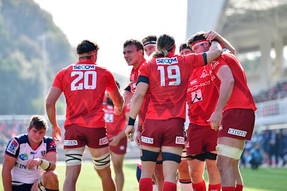 The Sunwolves celebrate a try against the Melbourne Rebels in 2020.