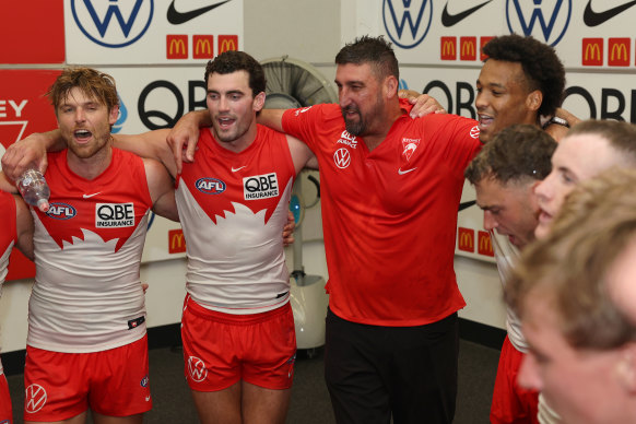 Dean Cox sings the Swans’ anthem for the first as senior coach. 