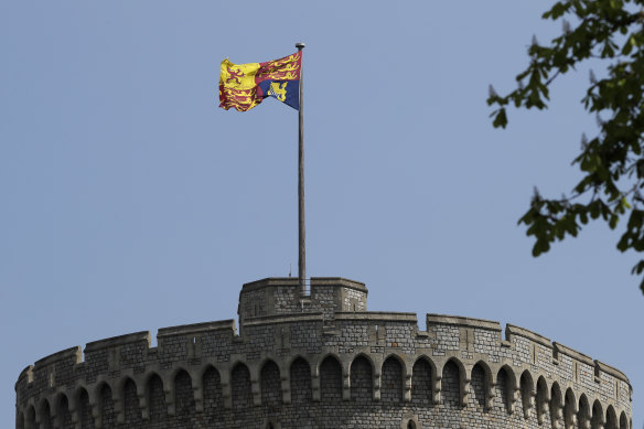 The Royal Standard flies above Windsor Castle in Windsor, England, to signal the Queen is in residence.