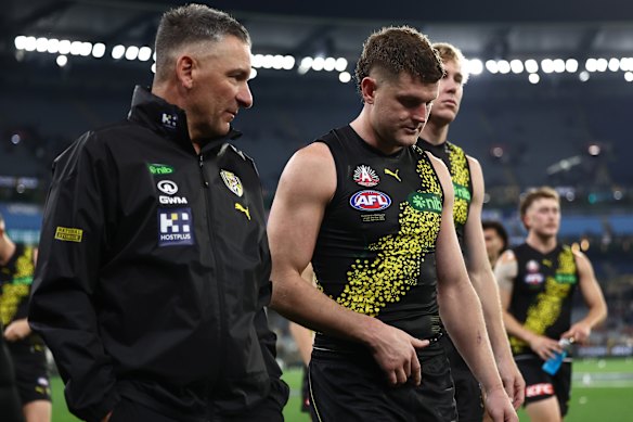 Adem Yze and Jacob Hopper leave the ground.