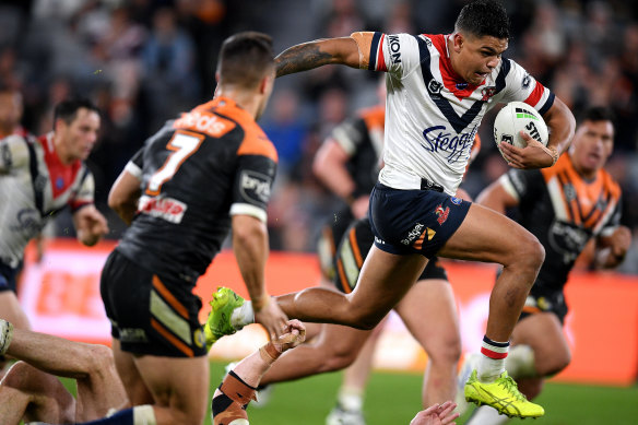 Stepping out: Latrell Mitchell was back to his bullocking best against the Tigers.