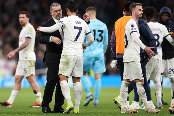 Ange Postecoglou embraces Son Heung-min after the match.