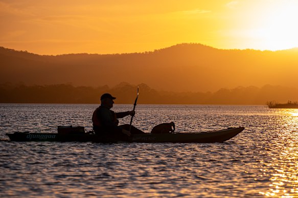 A Sunset and Stars Kayak Tour takes guests across Wallagoot Lake.