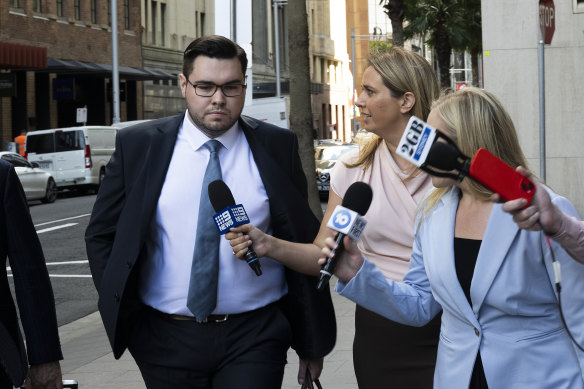 Bruce Lehrmann is questioned by journalists outside court on Wednesday morning.