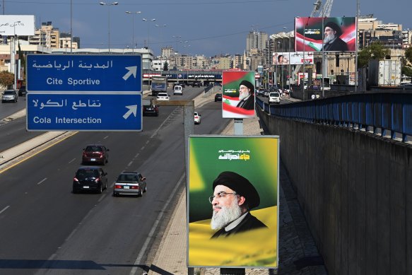 A billboard showing the image of assassinated Hezbollah leader Hassan Nasrallah on the airport road in Beirut.