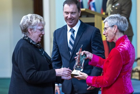 Moira Waye receiving her award from Governor Linda Dessau.