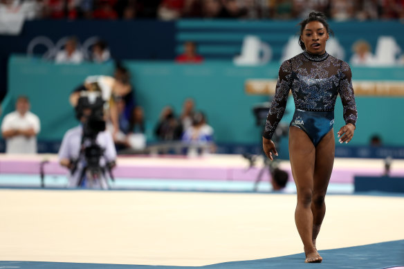 Simone Biles reacts after finishing her routine in the floor exercise.