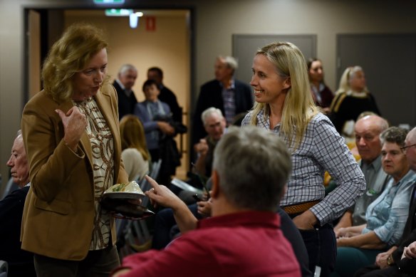 Kirsty O’Connell (right) an Independent candidate in the Upper Hunter by-election talks with members of the public.