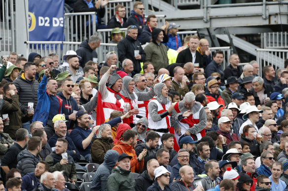 England's cricket fans cheer for their team during day three of the fourth Ashes Test.