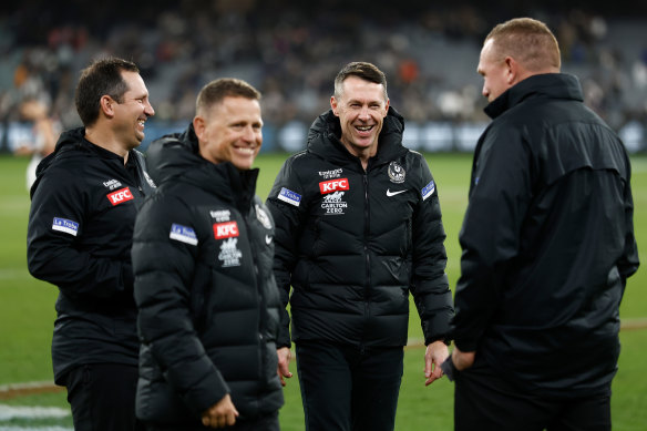 Collingwood coach Craig McRae (second from right) last year with his brains trust of (from left) Hayden Skipworth, Brendon Bolton and Justin Leppitsch.