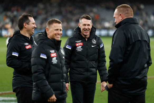 Collingwood coach Craig McRae (second from right) last year with his brains trust of (from left) Hayden Skipworth, Brendon Bolton and Justin Leppitsch.