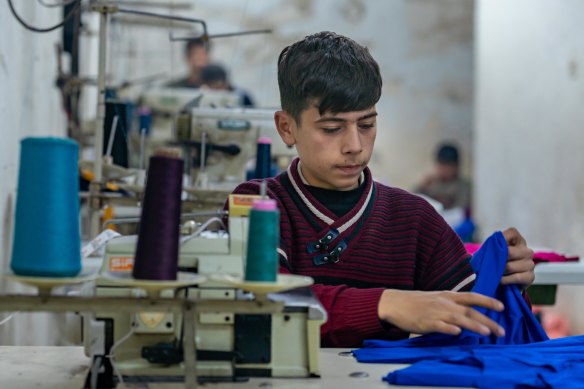 Ahmad works as a tailor in a small pyjama factory in Aleppo, Syria, from 8am to 8pm six days a week.