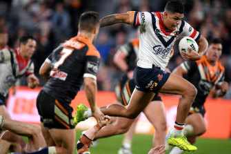 Stepping out: Latrell Mitchell was back to his bullocking best against the Tigers.