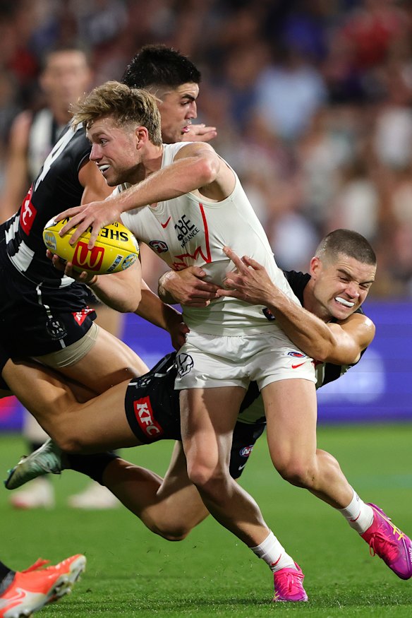 Brayden Maynard, pictured here laying a tackle on Braeden Campbell with teammate Lachlan Sullivan, had a standout game.