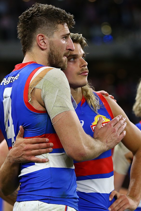 Western Bulldogs stars Marcus Bontempelli and Bailey Smith after the final siren.