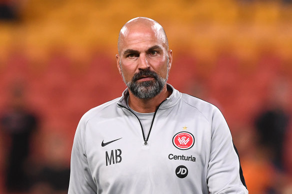 Tough calls: Markus Babbel walks onto the pitch after the match.