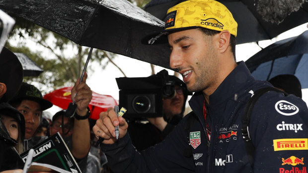 Daniel Ricciardo greets fans at Albert Park.