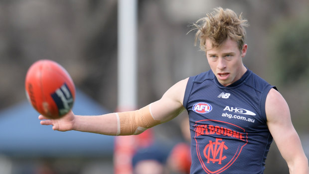 Mitch Hannan has signed a new deal with the Demons.