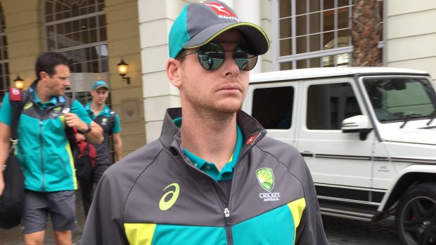 Under pressure: Australian captain Steve Smith leaves a hotel in Cape Town.
