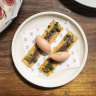 MoVida’s signature anchovy with smoked tomato sorbet.