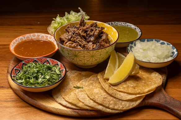 Taco platter with lamb barbacoa.