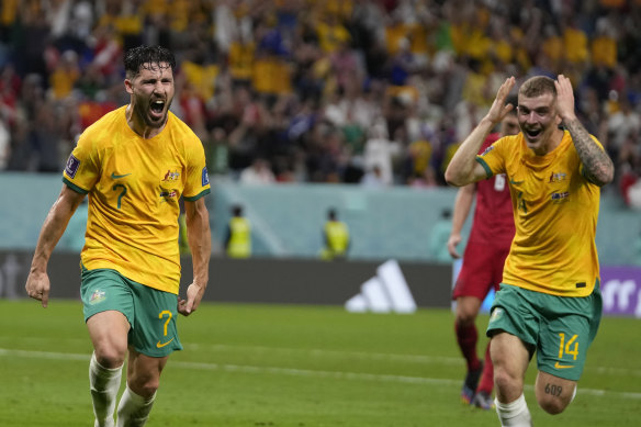 Mathew Leckie (left) and Riley McGree celebrate the former’s winner against Denmark.