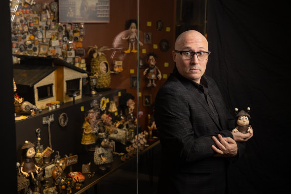 Adam Elliot in front of one of the sets from Memoir of a Snail, on display at ACMI.