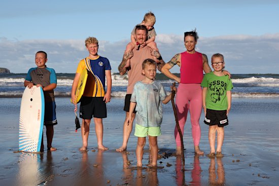 NSW South Coast couple Steph Powell, 39, and husband Mark Powell, 40, with their five sons (L-R): Harlo, 11, Taj, 13, Bodhi, 3, Sabre, 7, Hendrix, 9. Steph says she would have more children if they didn’t grow up. 