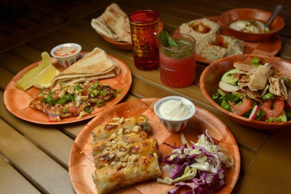 Spiced lamb cigars and chilli snapper with dips and salad. 