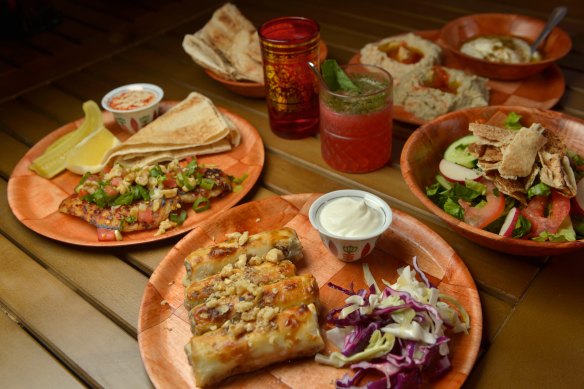 Spiced lamb cigars and chilli snapper with dips and salad.