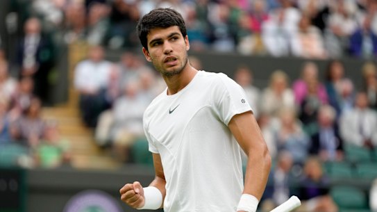 Spain’s Carlos Alcaraz celebrates after winning a point against Jeremy Chardy of France in a first round men’s singles match on day two of the Wimbledon tennis championships in London, Tuesday, July 4, 2023. (AP Photo/Kirsty Wigglesworth)