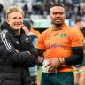 Samu Kerevi, with ice on his hand after the match, speaking to Damian McKenzie and Beauden Barrett.