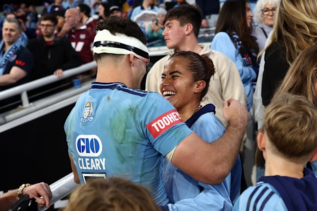Nathan Cleary celebrates with girlfriend Mary Fowler.
