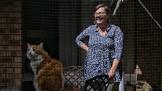 Oondine Evans has constructed an outdoor cat pen for her two cats, Butternut and Biscotti, so they are not threats to local wildlife.