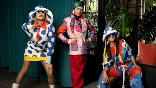 Fashion Designer Monika Branagan (centre) with models Shanesse Wong and Tori Michael. Designers who are are braving tough retail conditions by launching labels. They are hoping that bold style signatures will buck the trend. Sydney.