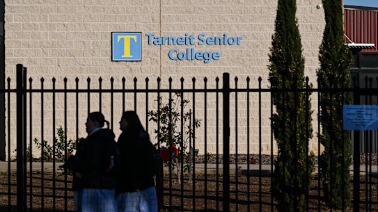 Students arrive at Tarneit Senior College after footage emerged yesterday of a fight involving teachers and pupils.