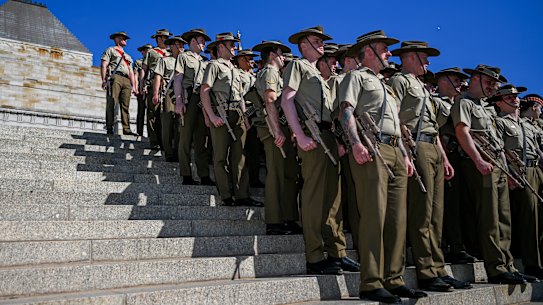 Soldiers from the Australian Army 4th Brigade 2nd Division attend Anzac Day at the Shrine of Remembrance in Melbourne.
