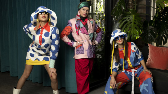 Fashion Designer Monika Branagan (centre) with models Shanesse Wong and Tori Michael. Designers who are are braving tough retail conditions by launching labels. They are hoping that bold style signatures will buck the trend. Sydney.
