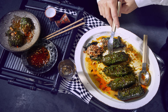 Kale rolls with spicy merguez sausage and rice.