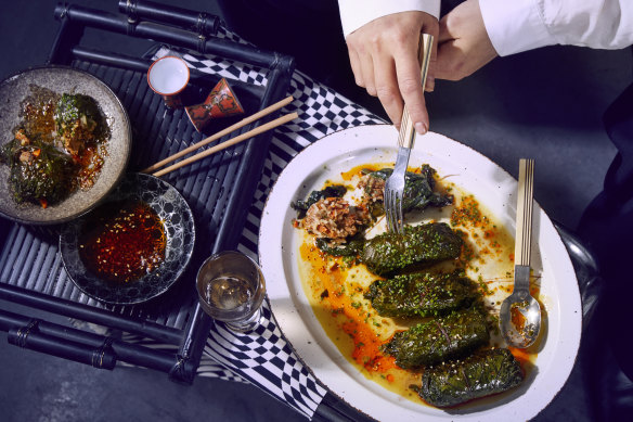 Kale rolls with spicy merguez sausage and rice.