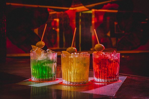 The signature green (herbal), yellow (tropical) and red (classic) negronis at Herbs Taverne
