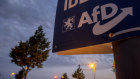 An election poster of right-wing party AfD is fixed on a pole during the Hesse federal state election in Frankfurt, Germany.