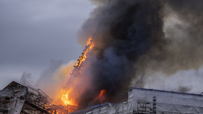Spire collapses as fire rips through historic Copenhagen stock exchange
