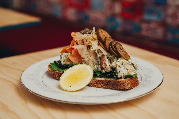 The Scandi, loaded up potato salad on sourdough with smoked salmon sauerkraut capers and pickles.