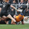 Tom Hooper scores for the Wallabies against New Zealand.