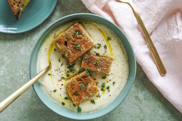 Cauliflower, thyme and potato soup topped with mini cheese toastie bites.