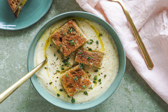 Creamy cauliflower and potato soup topped with mini cheese toastie bites.